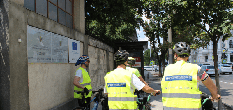 People in hi vis on bikes surveying city streets